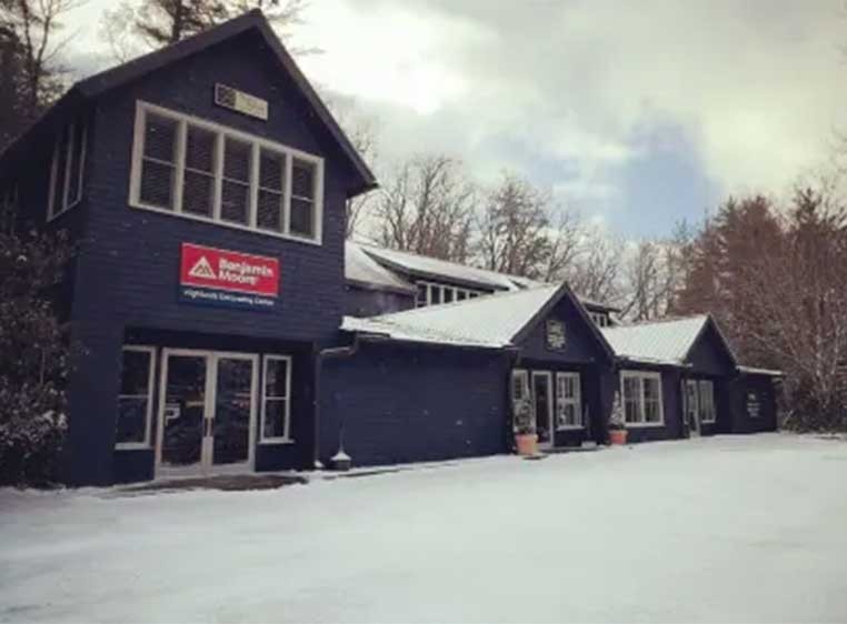 Snowy dealership storefront